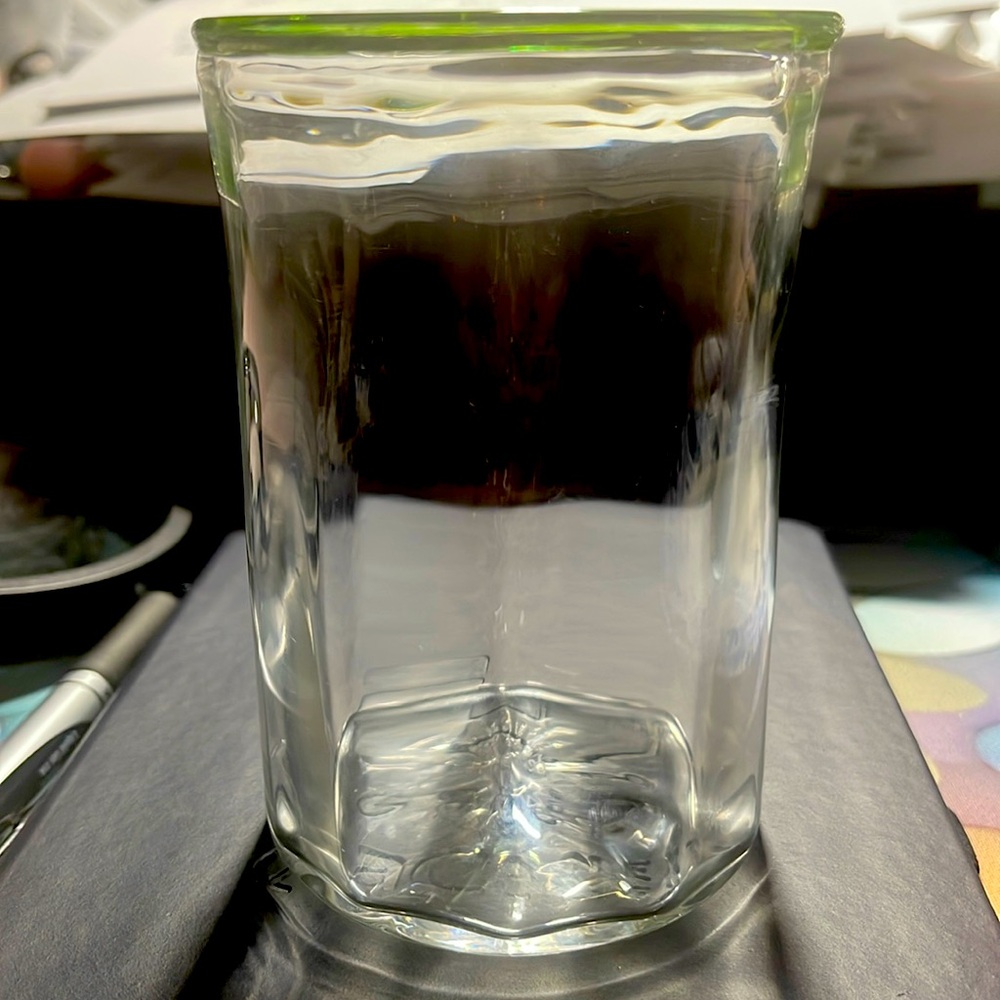 Hand blown glass green and clear ribbed juice tumbler. Signed LM95